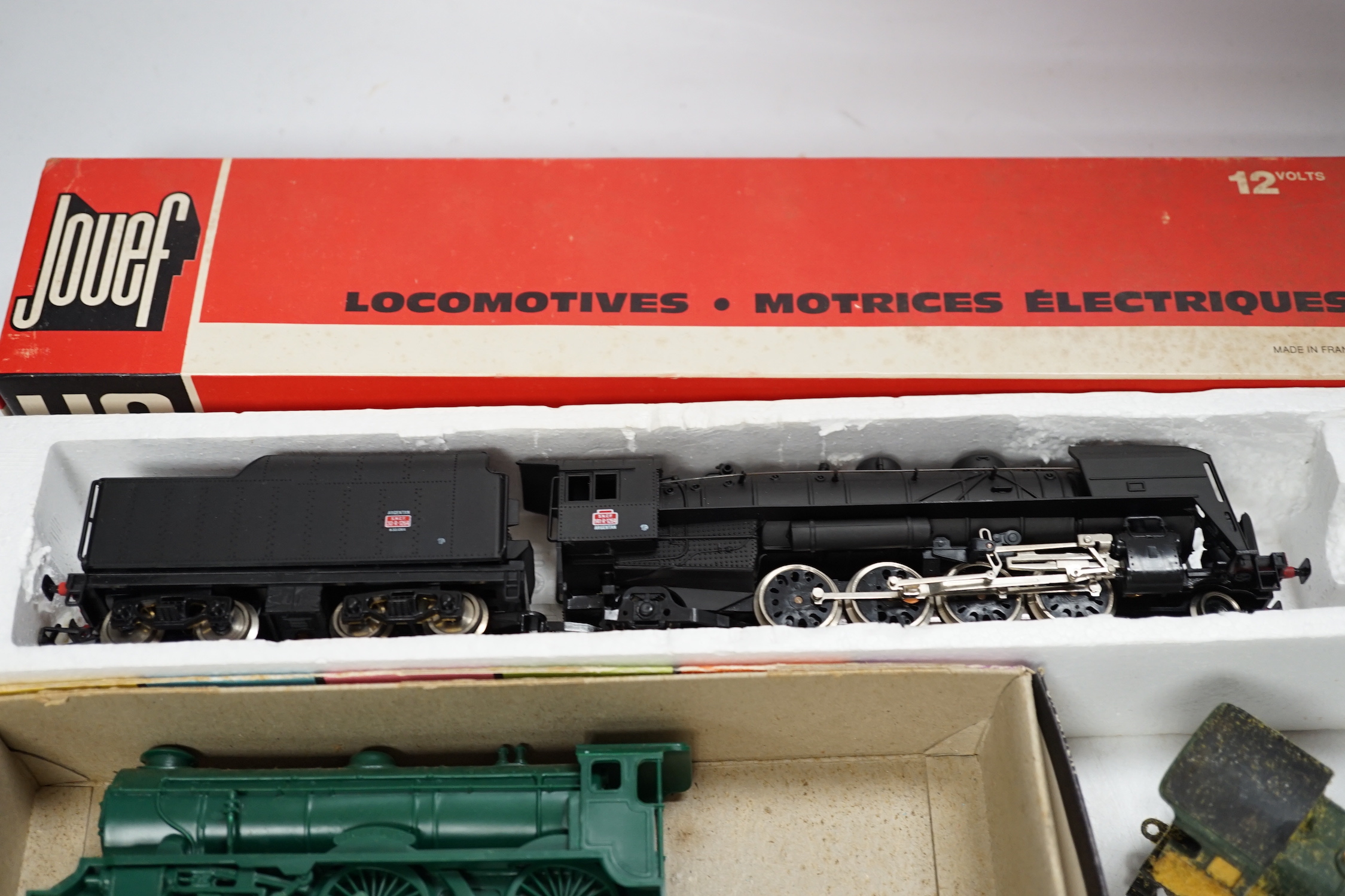 A quantity of 00 and HO gauge model, railway, including; a boxed Jouef SNCF 2–8–2, tender locomotive (8272), a Jouef SNCF clockwork train set, a Tri-ang Class L1 4-4-0 loco, (tender missing), an empty box for Hornby Dubl